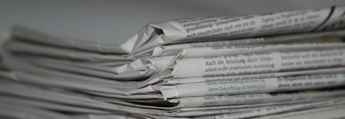 SystemSeed update Stack of newspapers