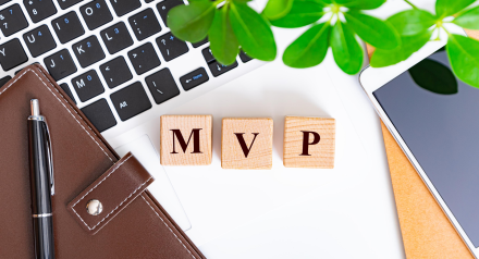 MVP spelled out in tiles on a desk