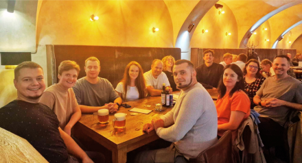 SystemSeed team members all sitting around a table together